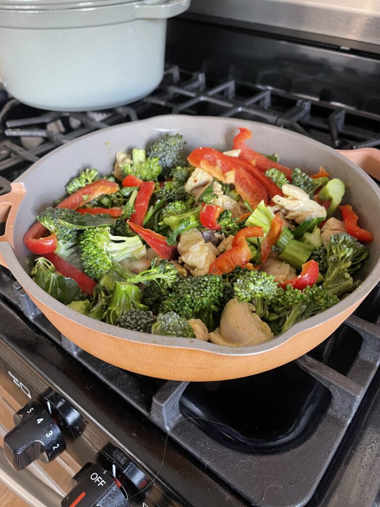 Veggies and chicken in skillet