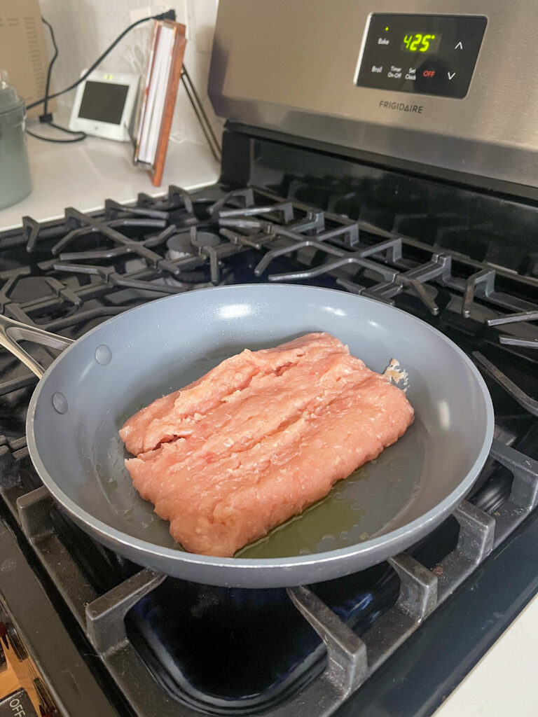 Ground chicken in skillet