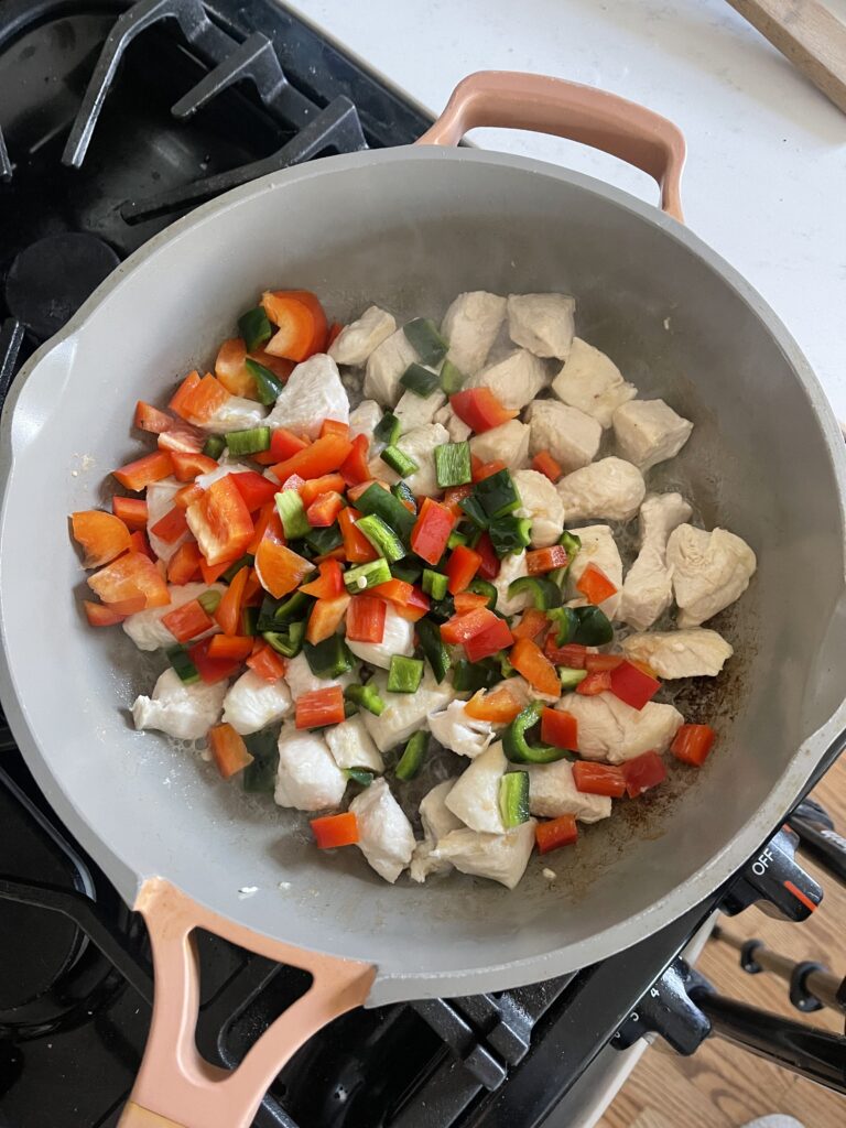 Chicken and veggies in skillet